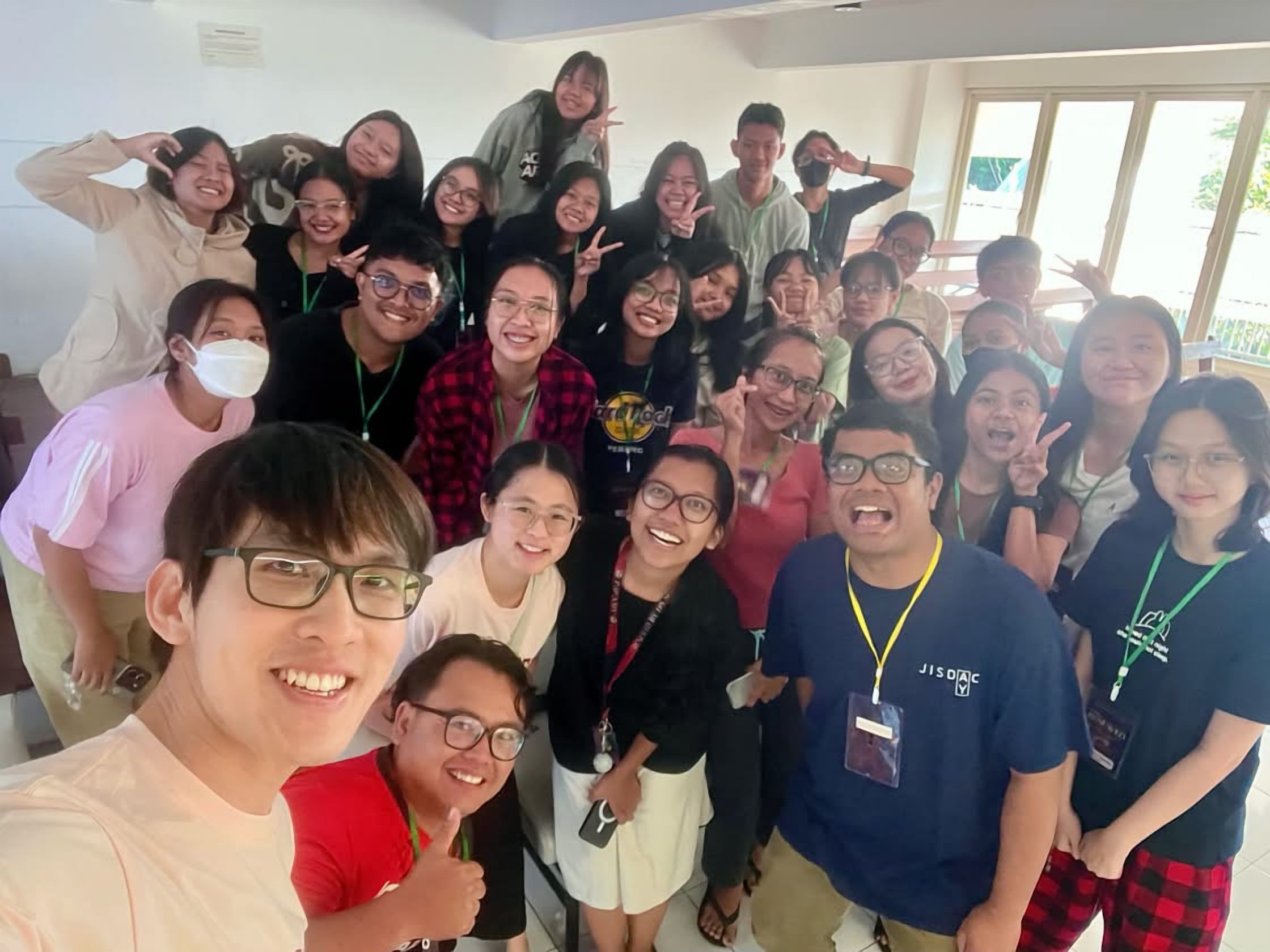 A group selfie with participants at the Indonesia conference media seminar