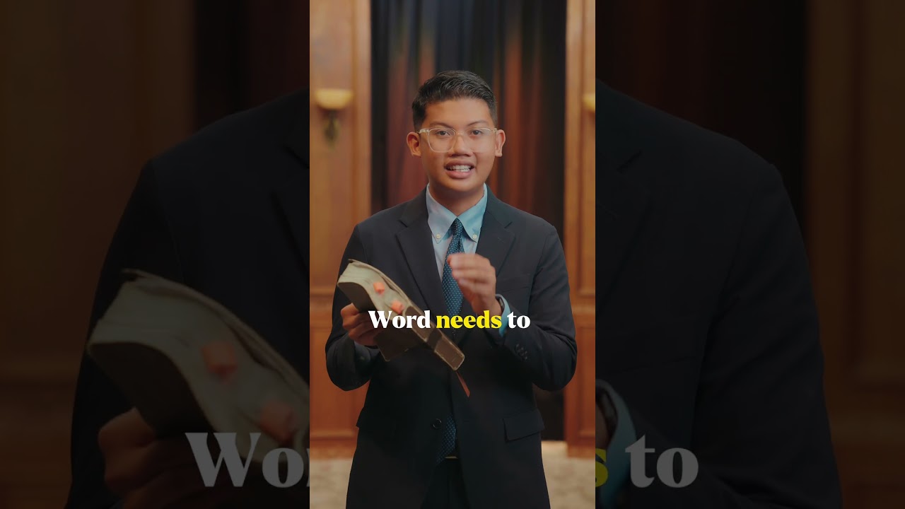 Thumbnail for the Short &ldquo;The Lampstand&rsquo;s Secret That Could Change Your Life&rdquo; — a young man in a suit and tie holding a Bible, speaking to camera