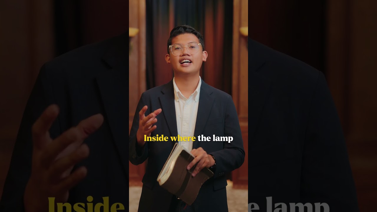Thumbnail for the Short &ldquo;What Was Hidden Behind the Veil? Most Never Knew&rdquo; — a young man in a suit holding a Bible, speaking to camera