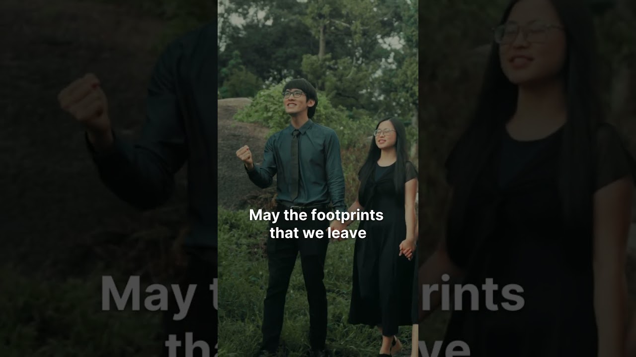 Thumbnail for the Short &ldquo;Leaving behind a legacy&rdquo; — a young man and woman singing outdoors among the trees