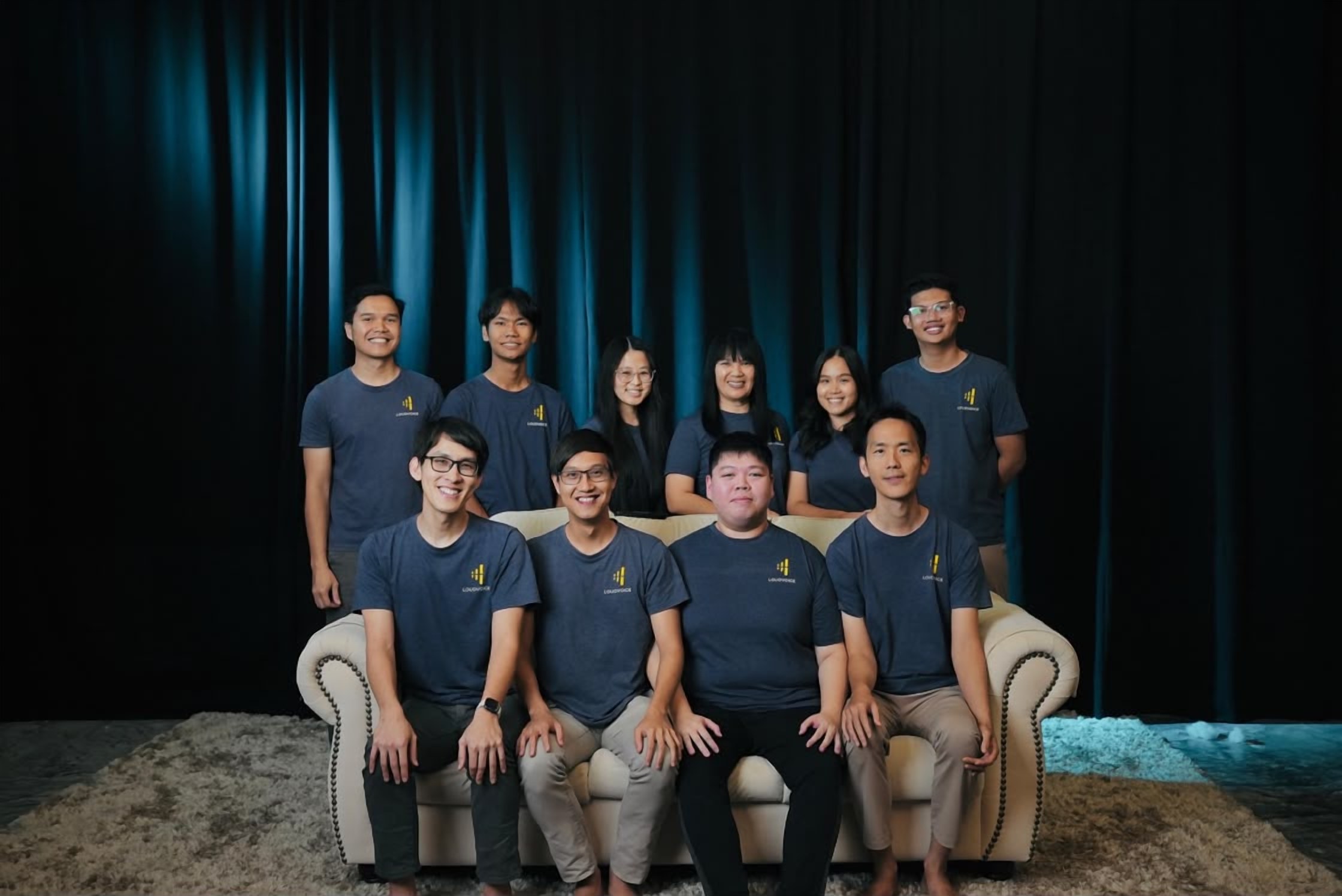 The LoudVoice staff team in matching LoudVoice shirts, group photo from 2025