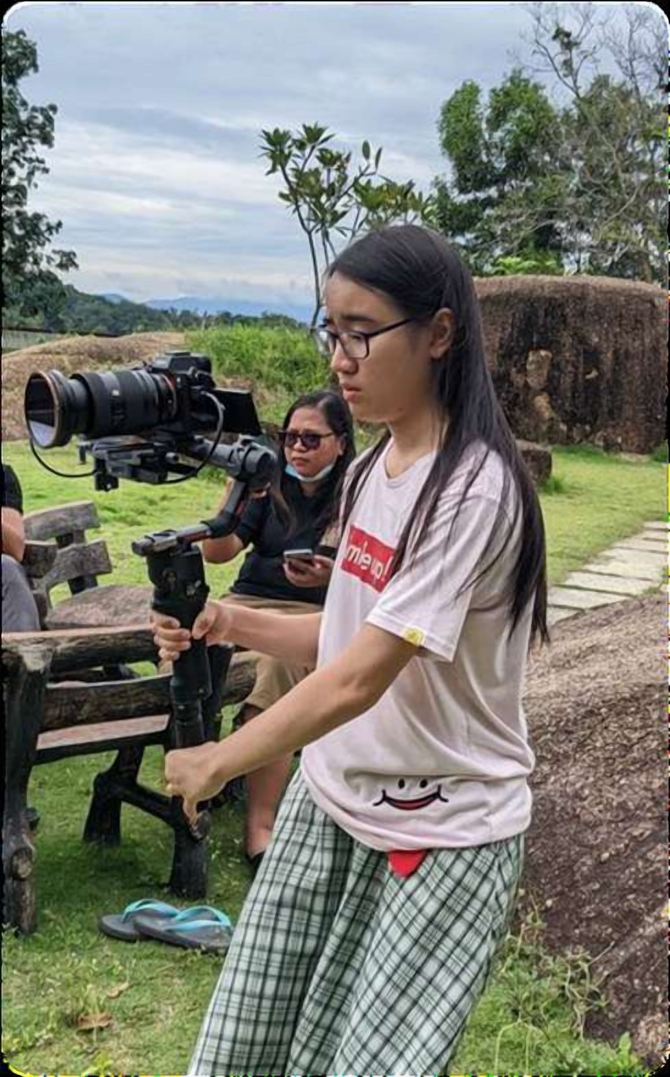 A volunteer with a camera gimbal