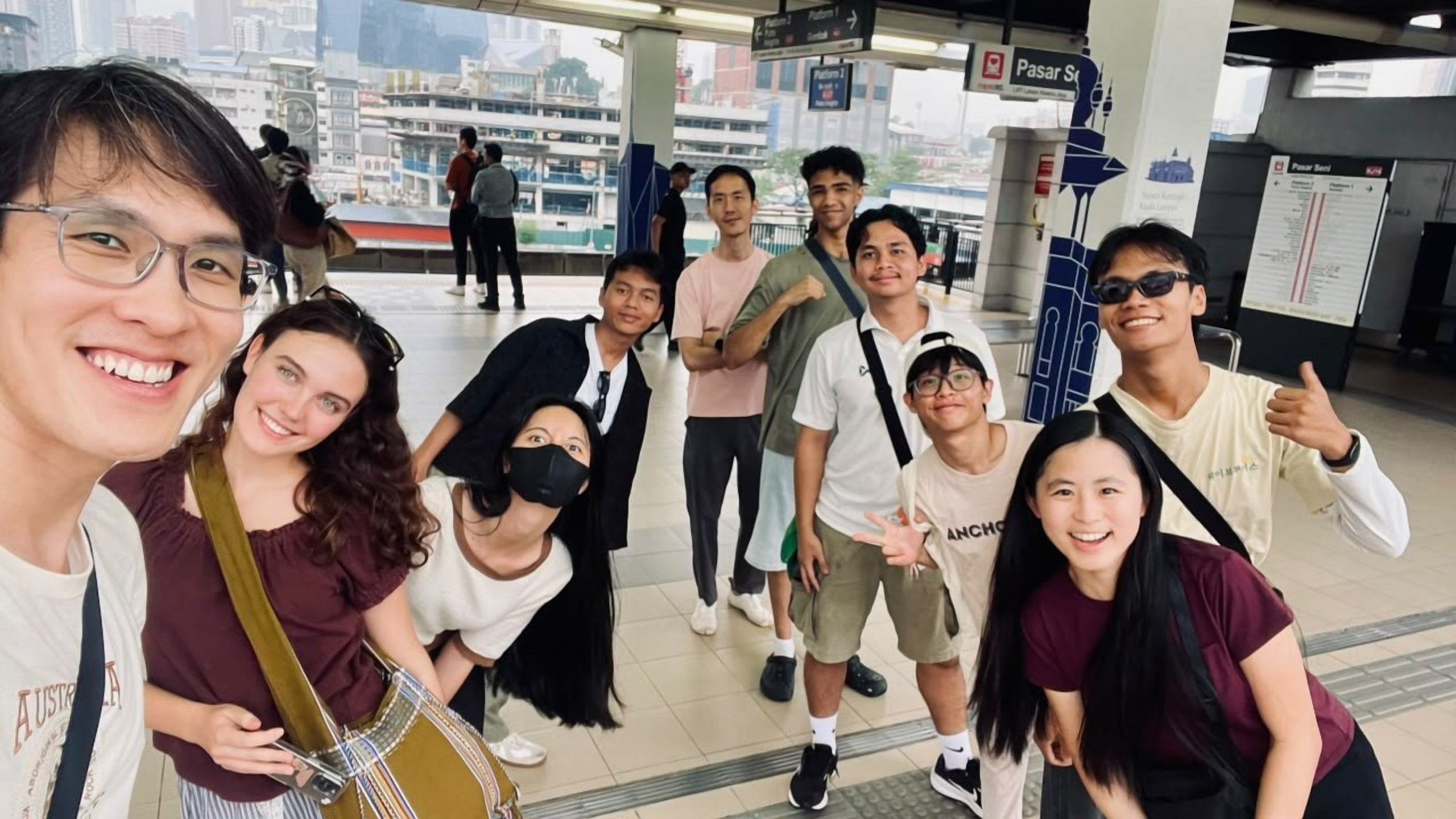 Volunteers on a trip to Kuala Lumpur, posing at Pasar Seni station